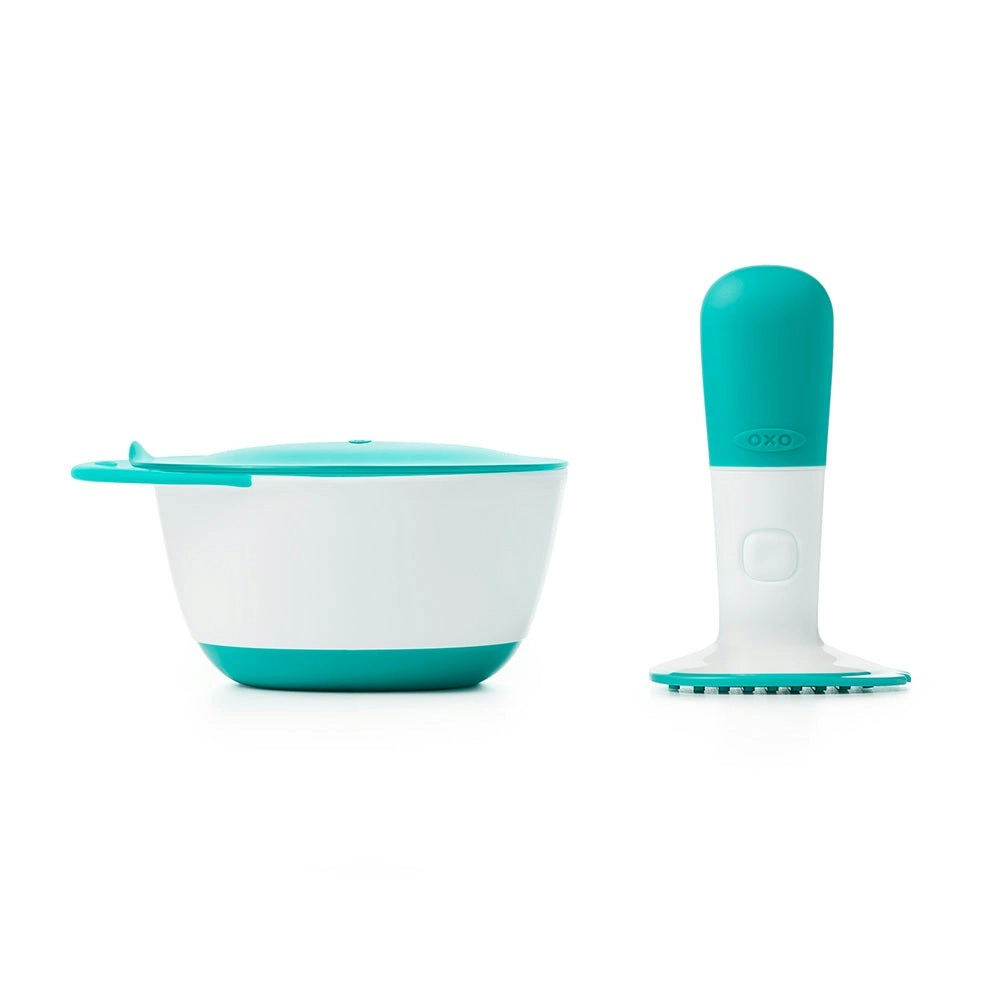 OXO Tot Compact Portable Baby Food Masher Teal With Masher Teeth And Steep Bowl